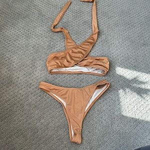 Tan criss cross swimsuit